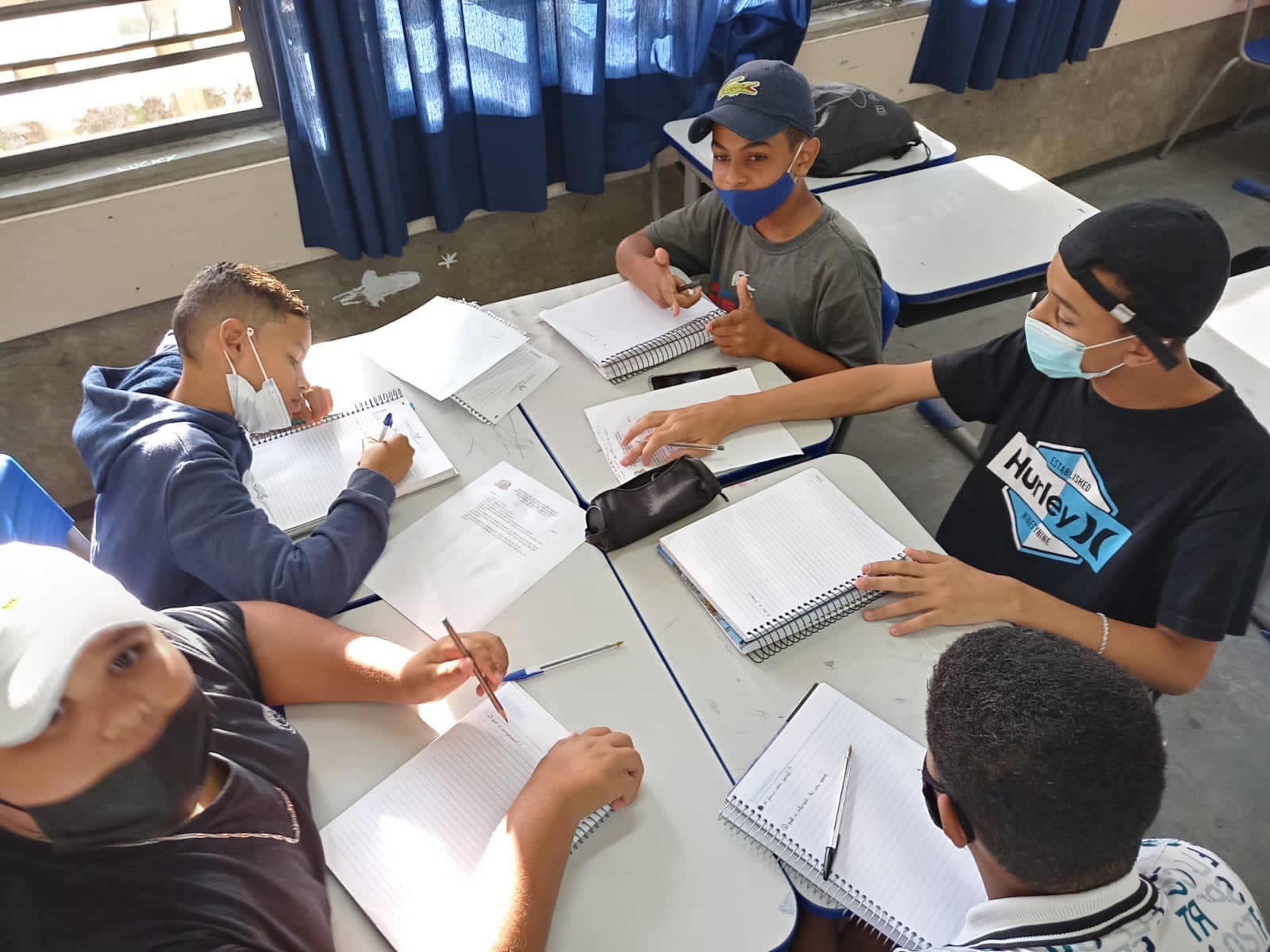 A generic square placeholder image with rounded corners in a figure.