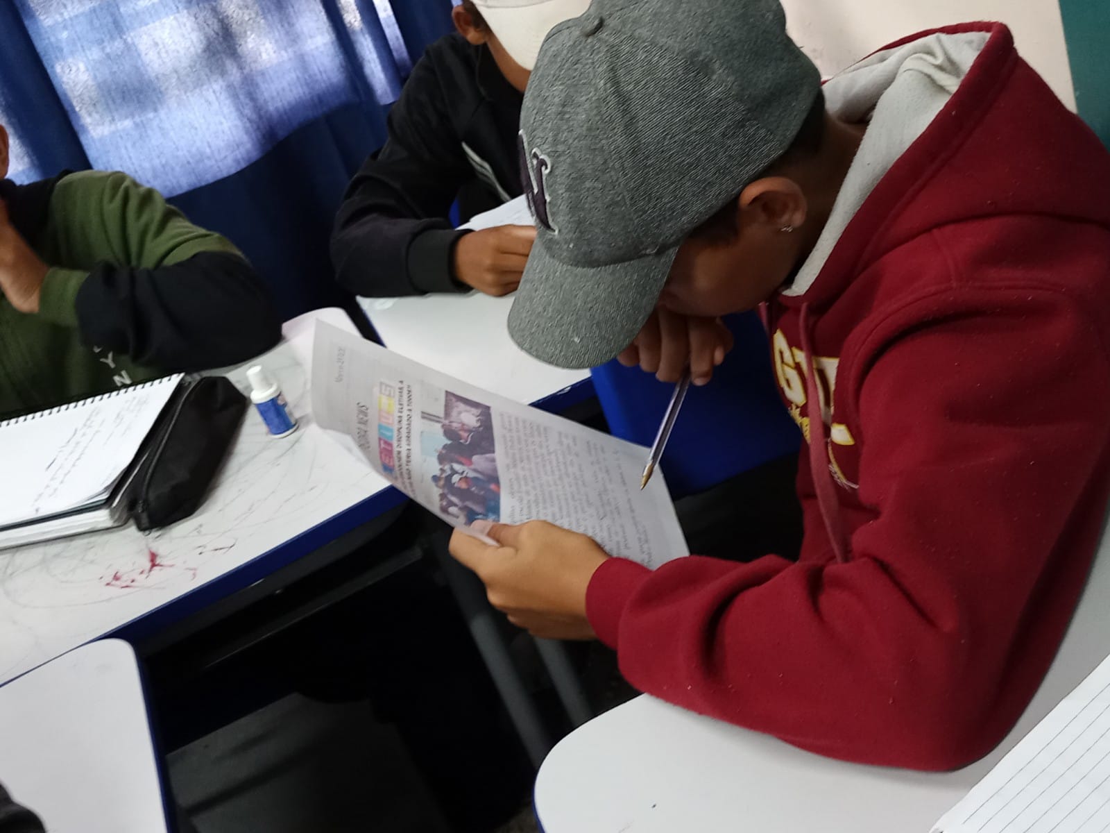 A generic square placeholder image with rounded corners in a figure.