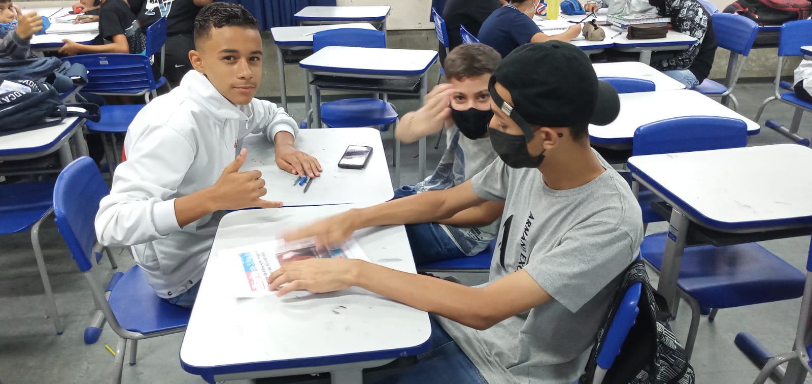 A generic square placeholder image with rounded corners in a figure.