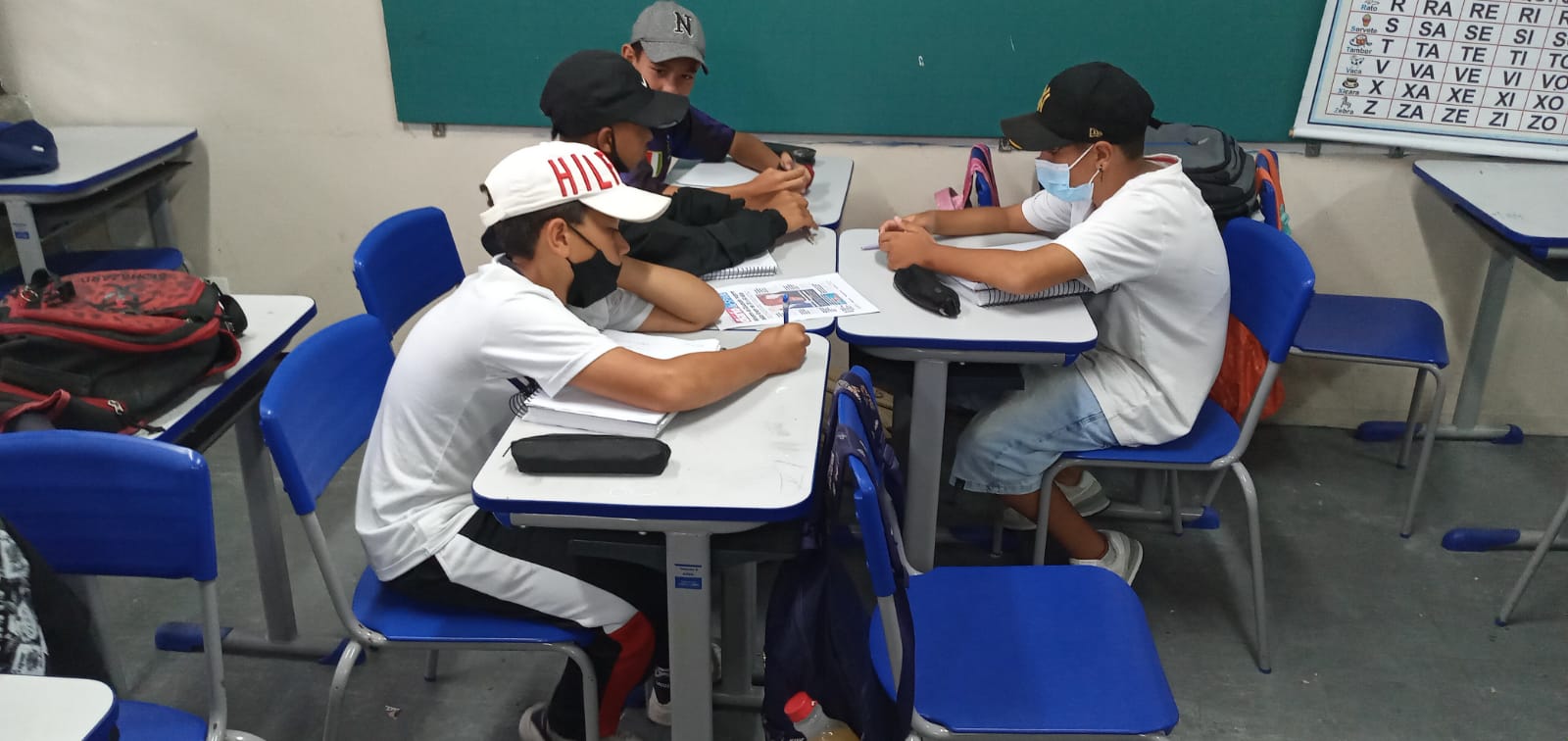 A generic square placeholder image with rounded corners in a figure.