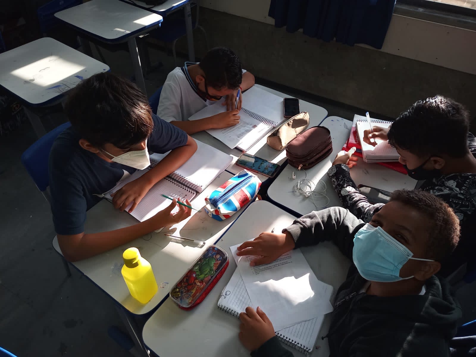 A generic square placeholder image with rounded corners in a figure.