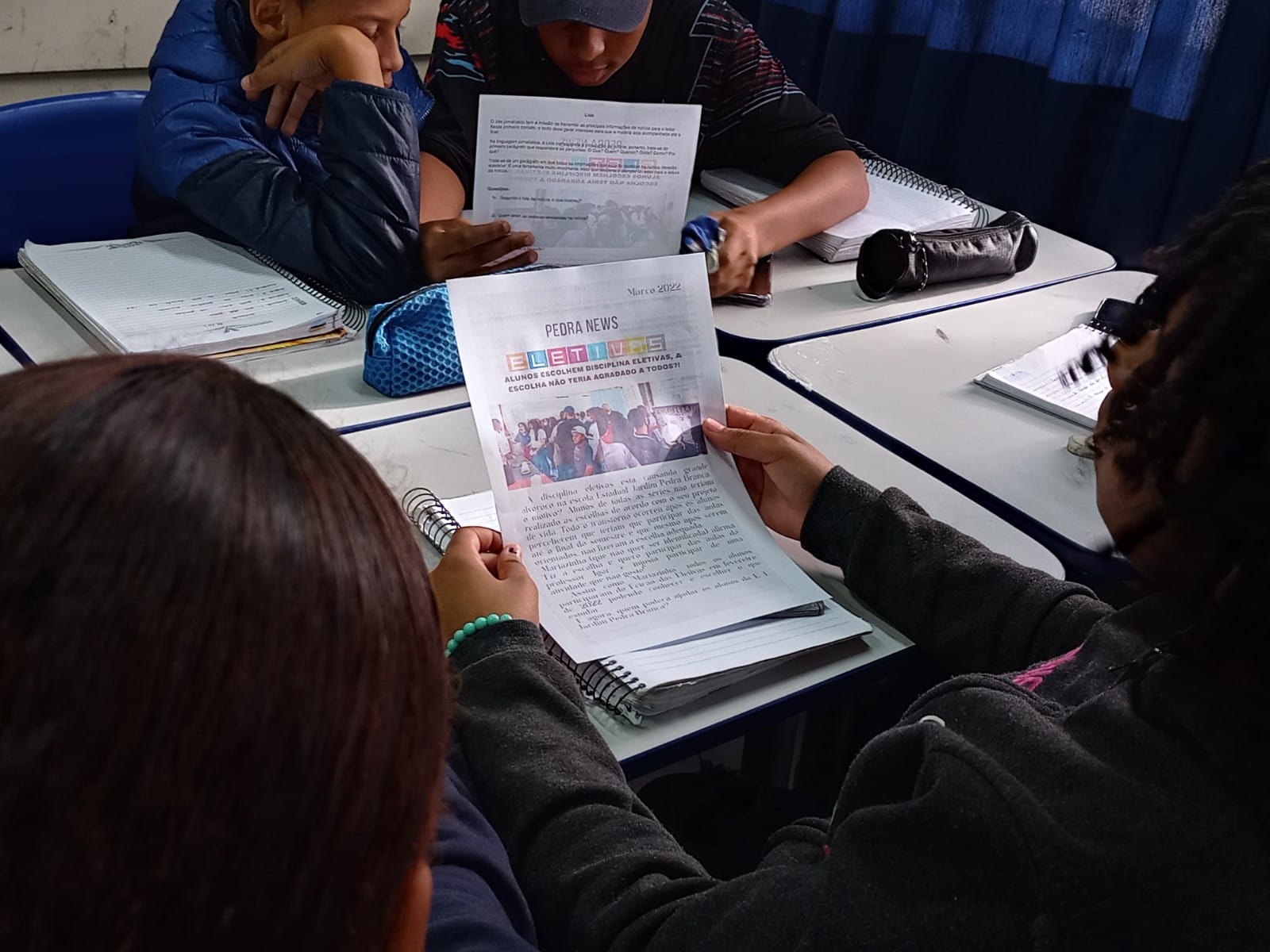 A generic square placeholder image with rounded corners in a figure.